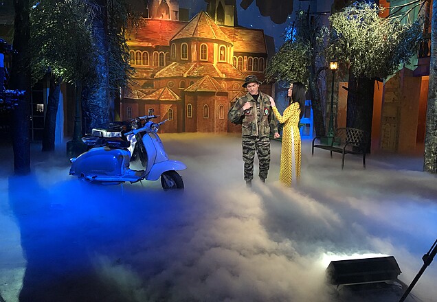 Custom themed stage scene with projection-mapped visuals