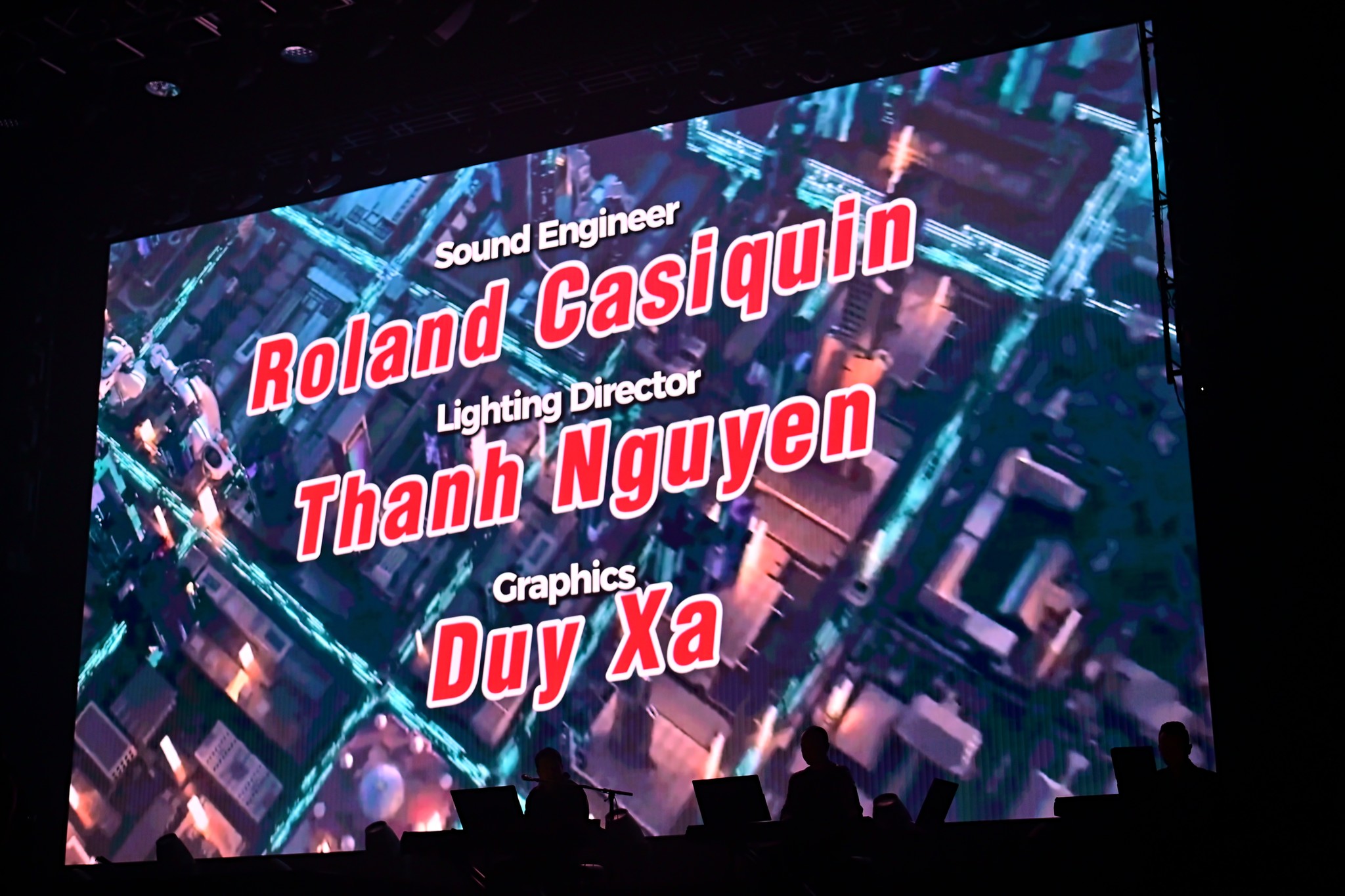 Production credits screen for The Venue live show in Las Vegas — Sound Engineer Roland Casiquin, Lighting Director Thanh Nguyen, Graphics Duy Xa